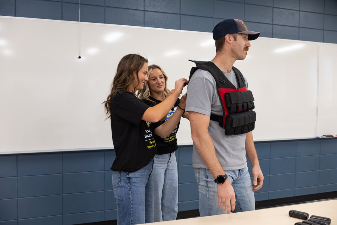 Ella Wieland and Kayla Neugebauer assisted with a stress management exercise
