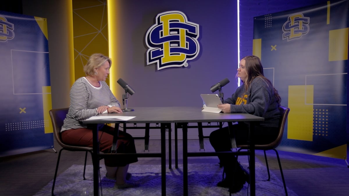 Laura Schoen Carbonneau on a podcast set with Heidi Bushong