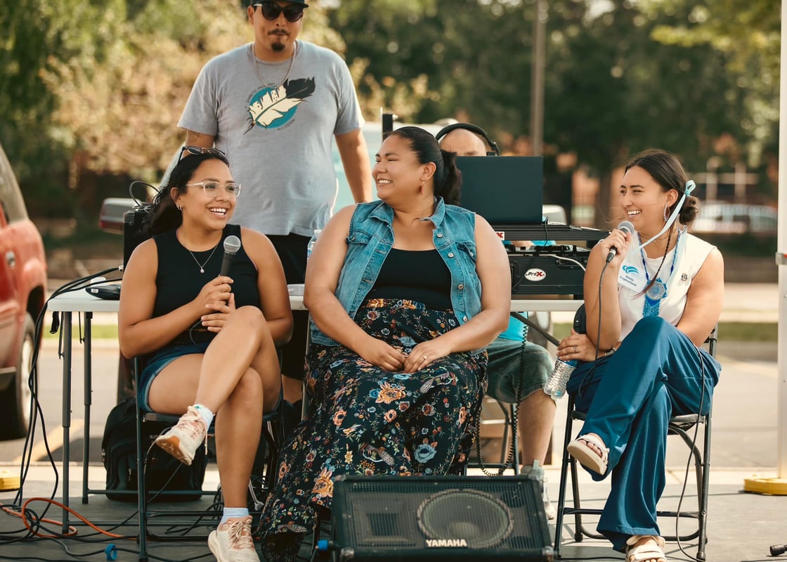 Group Stage Photo of 3 women