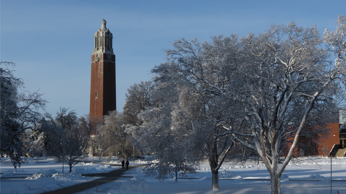 Snow on campus with campanile