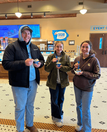 Hayley eating ice cream with friends