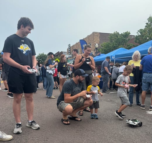 Student demonstrating a robot