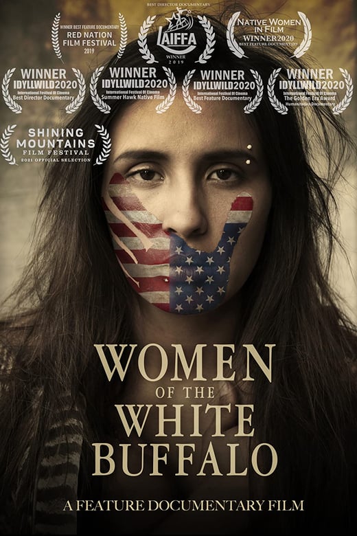 women of the white buffalo film poster shows a portrait of an indigenous woman, her hair is disheveled, she has a weary look in her eyes, over her closed mouth is a painted handprint that has the design of an up-side down USA flag. Hanging from her hair over her shoulder is a striped feather, printed at the top of the poster are awards and accolades for the film and on the bottom third of the poster is the title women of the white buffalo, a feature documentary film, printed in pale lettering